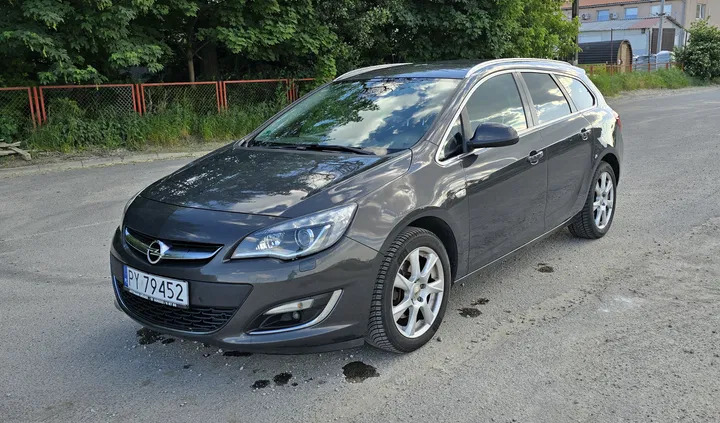 samochody osobowe Opel Astra cena 25500 przebieg: 239000, rok produkcji 2014 z Poznań